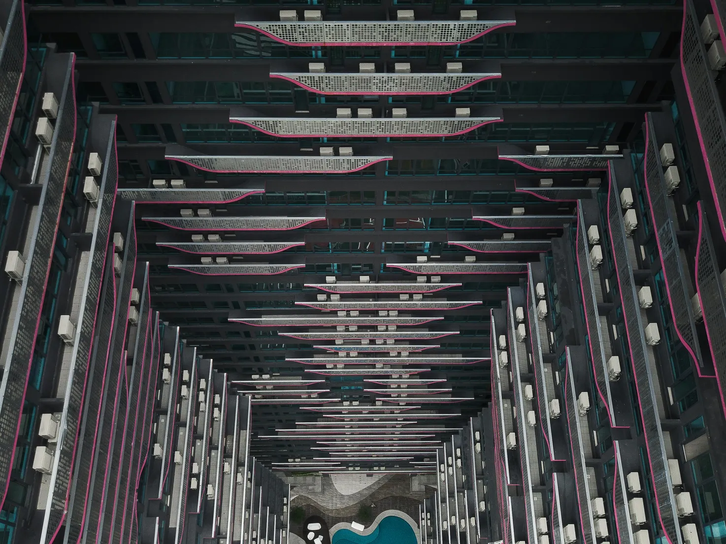 A large number of gnats floating on the surface of a swimming pool.