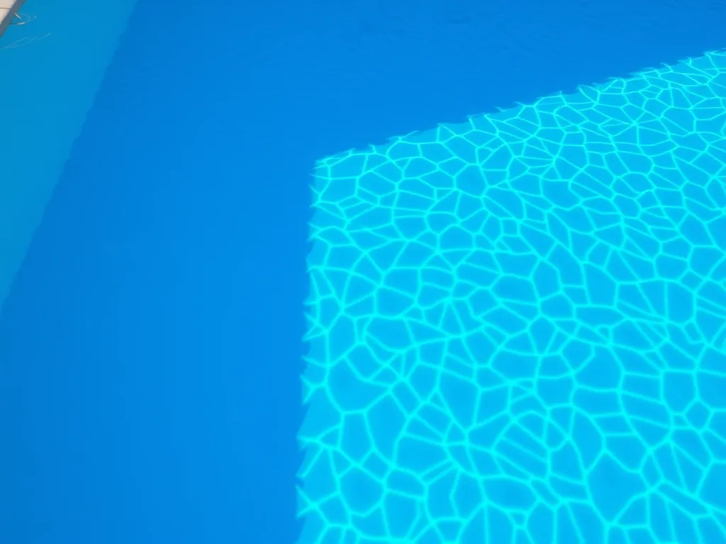 Swimming pool water surface, illustrating conditions related to lice transmission in pools.