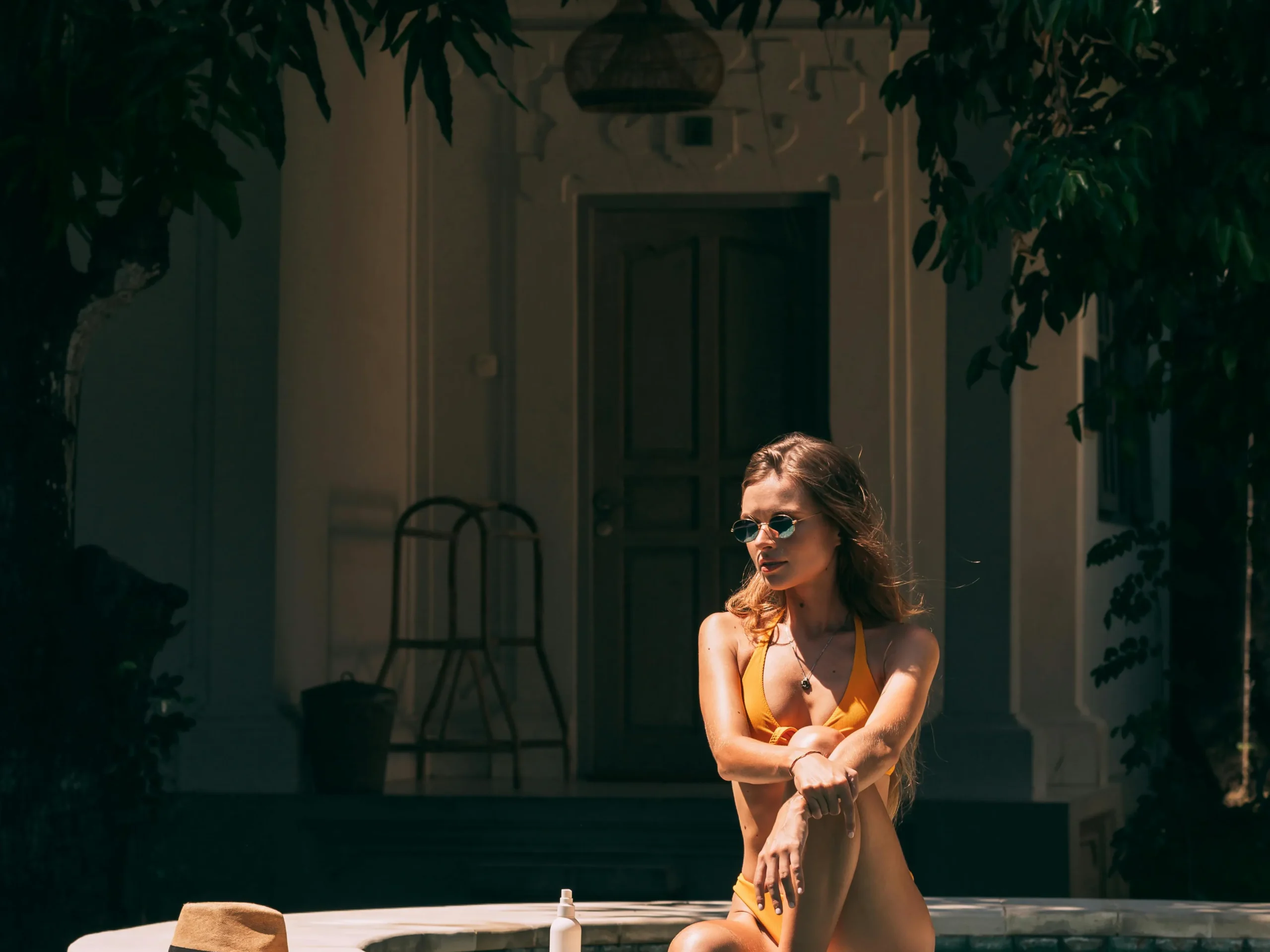 A woman enjoying leisure time at a pool hall, highlighting social aspects of the business.