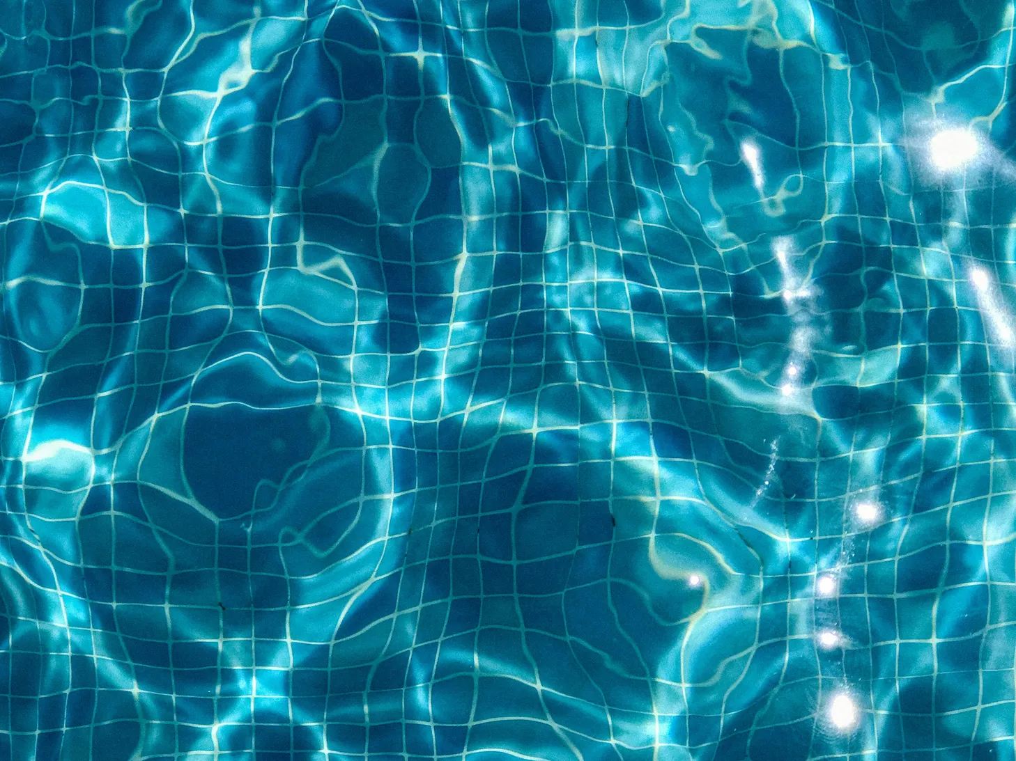 Clear pool water with grid pattern, related to using RV antifreeze in a pool